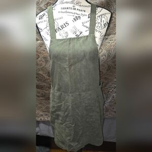 Overall style suede feel green dress.